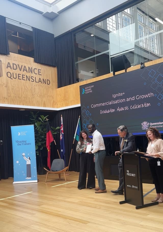 Noah receiving Queensland Government award